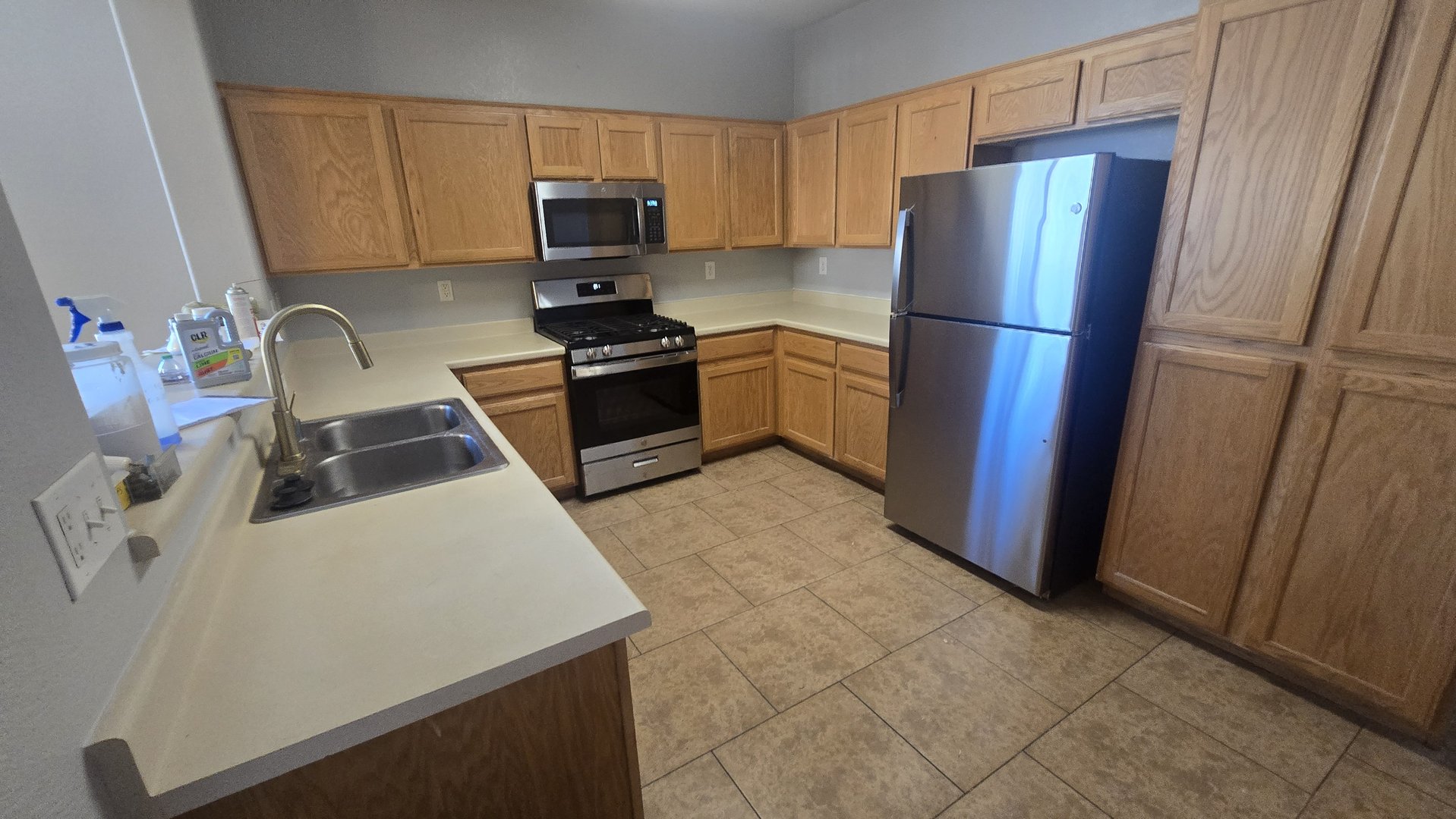 rental_turn_new_kitchen_appliances_sink_install.jpg